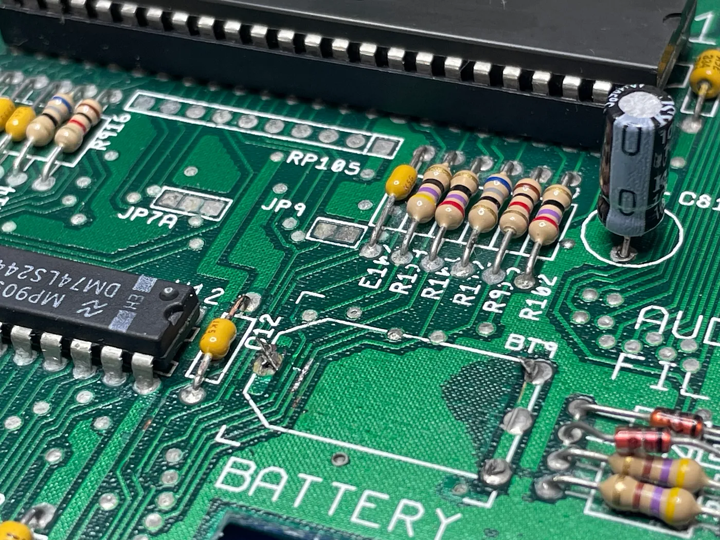 The corroded PCB track under the battery that needed tinning.