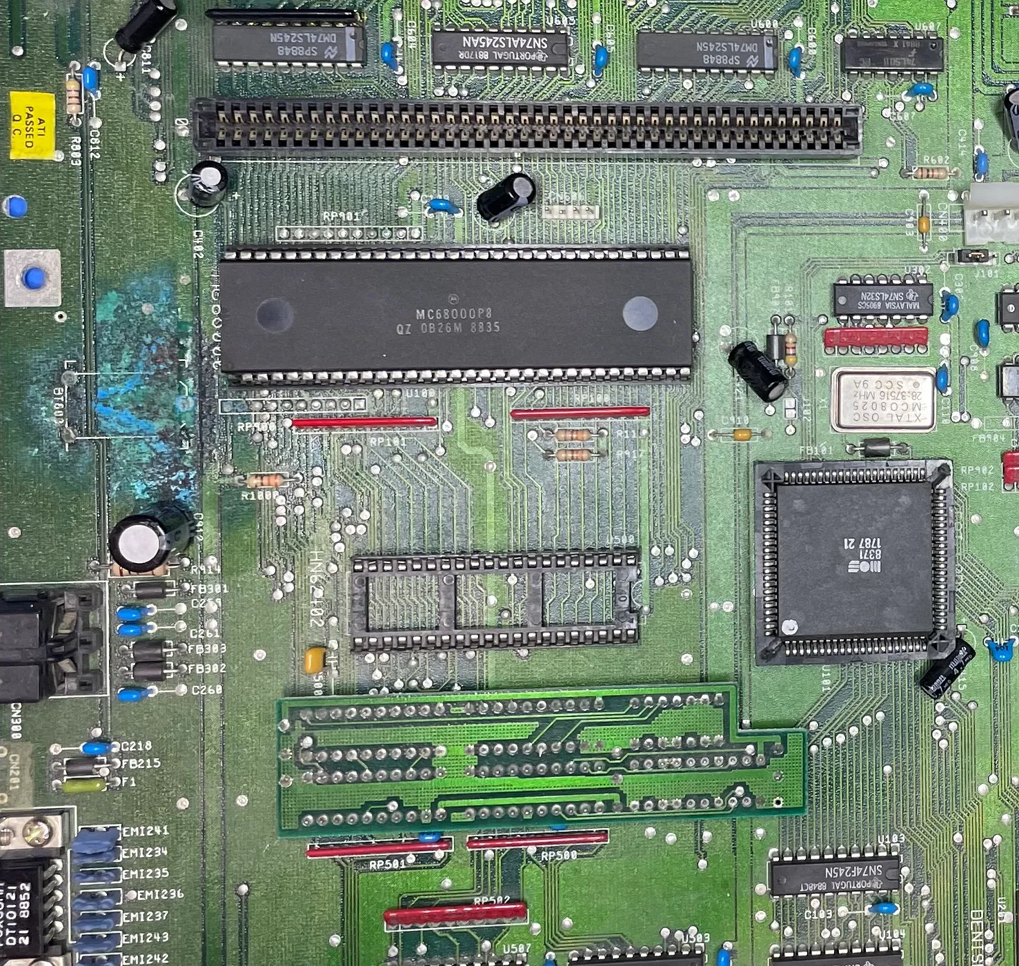 In contrast, this particular board’s (an Amiga 1500 (2000), Rev 6) damage is caused by a Varta battery, which resulted in corroding the CPU and its socket since the battery’s innards crept into its area.